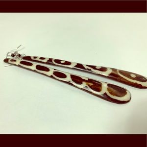 Brown and ivory earnings